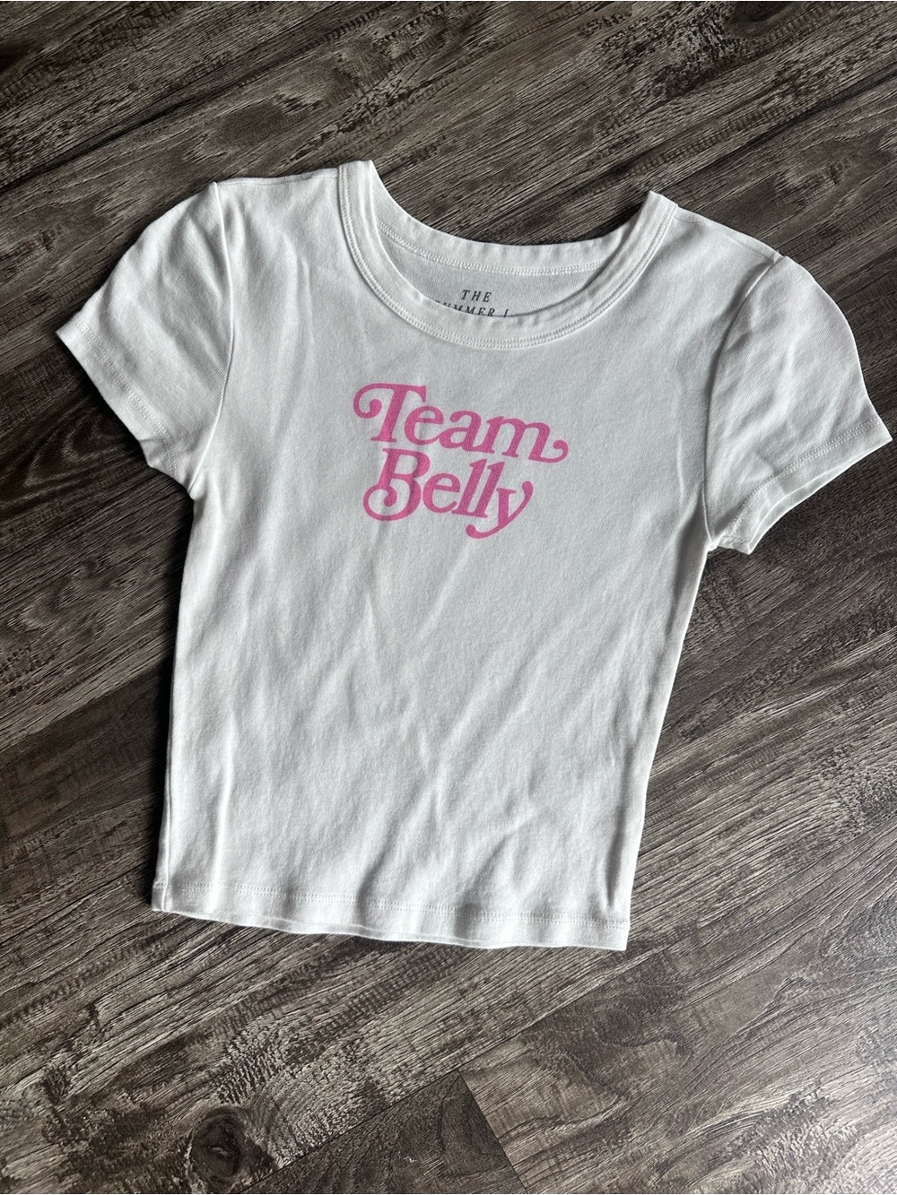 American Eagle Outfitters White Short Sleeve Tee with Pink "Team Belly" Graphic